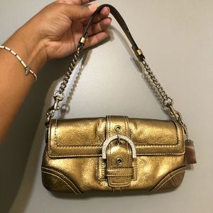 Coach gold shoulder bag